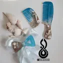 تصویر 2 ست شانه و گیره مو طرح دریایی